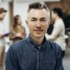portrait-smiley-businessman-min